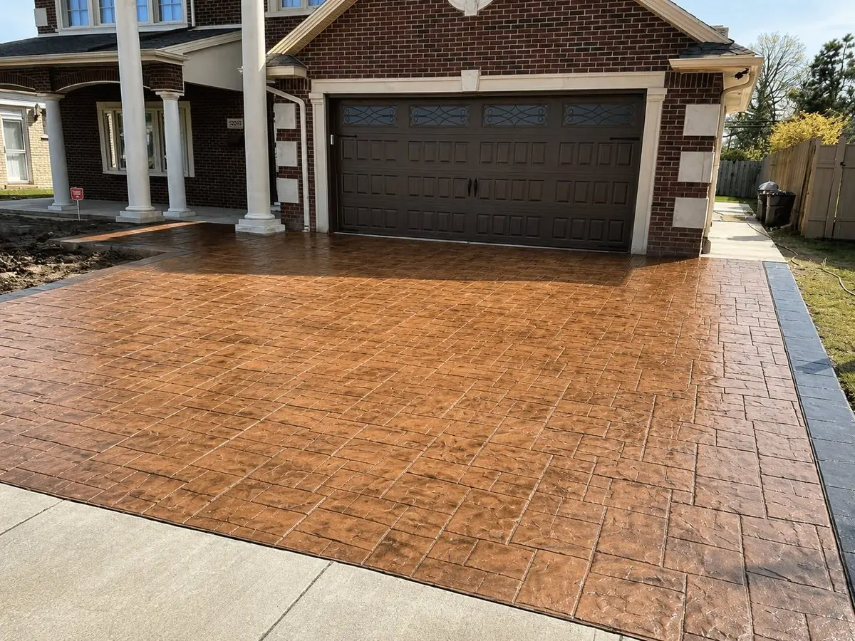 Stamped concrete driveway with charcoal border in Dearborn Heights, MI